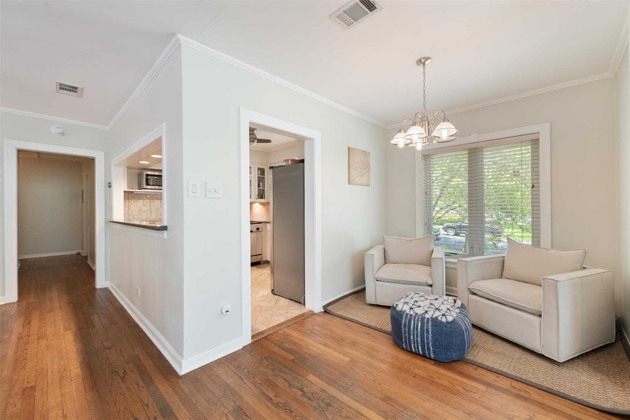 Rich hardwood floors flow through this welcoming