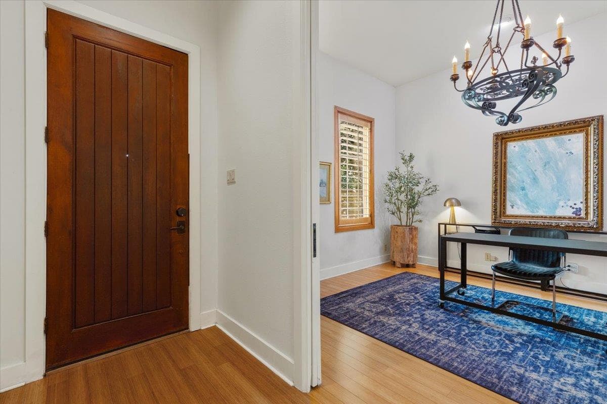 Entrance foyer featuring hanging lights and light