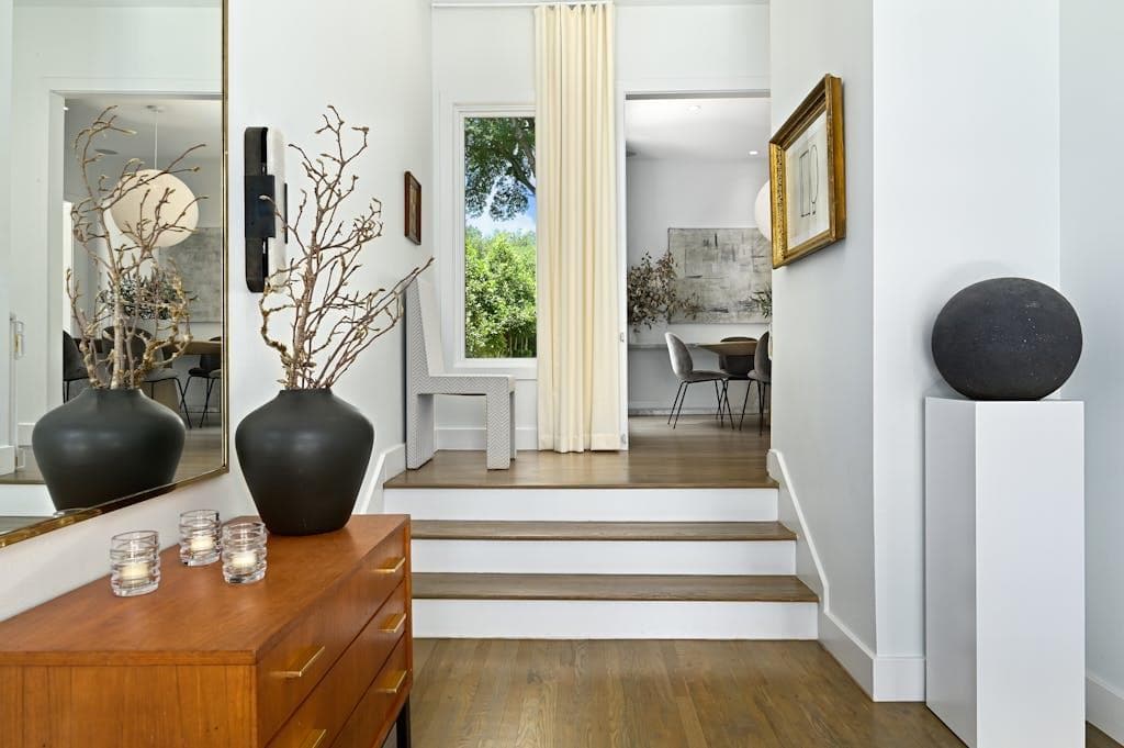 Entrance foyer featuring dark wood-style flooring