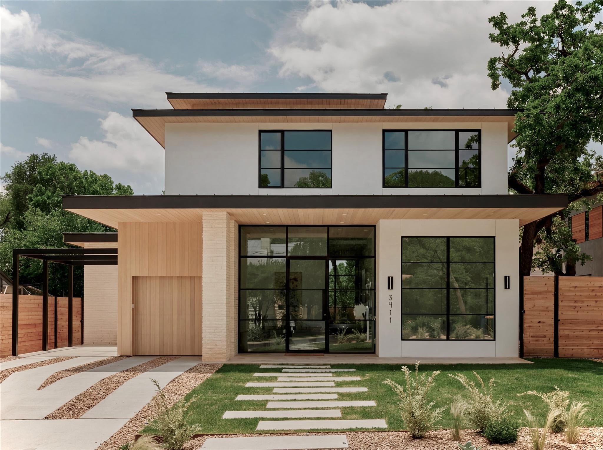 Modern two-story exterior featuring a flat roofli