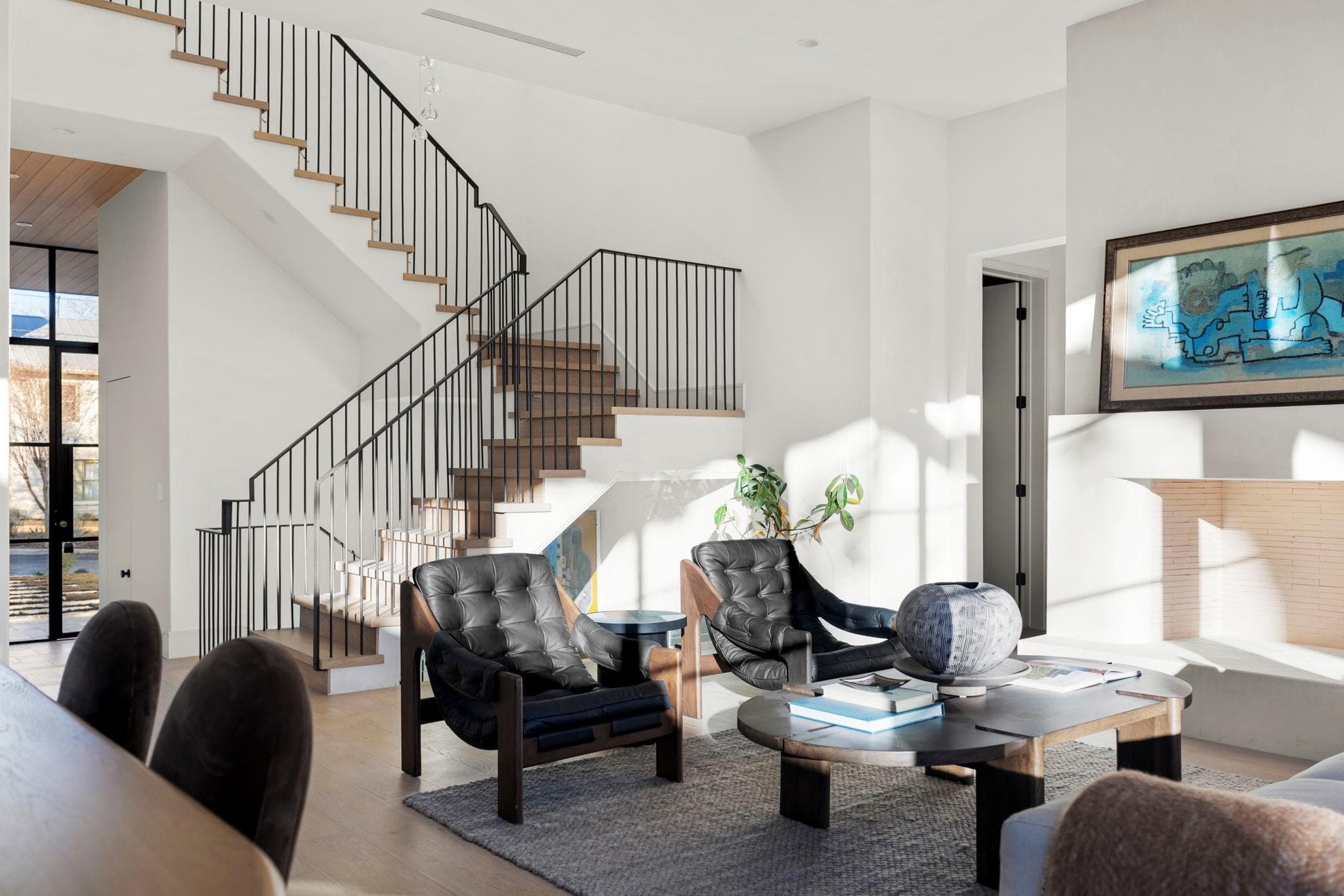 Open-concept living space with a contemporary sta