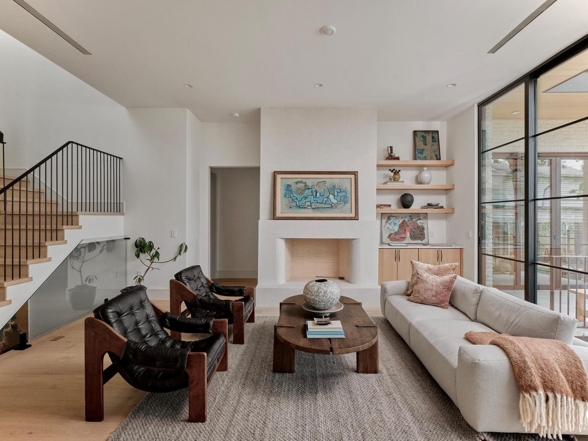 Living area featuring a floor-to-ceiling fireplac